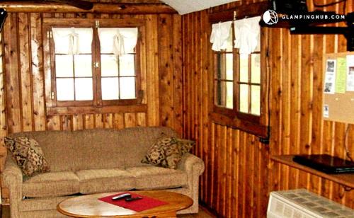 West Branch House | Cozy Cabin Rental with Stunning Lake Views in West Branch, Michigan
