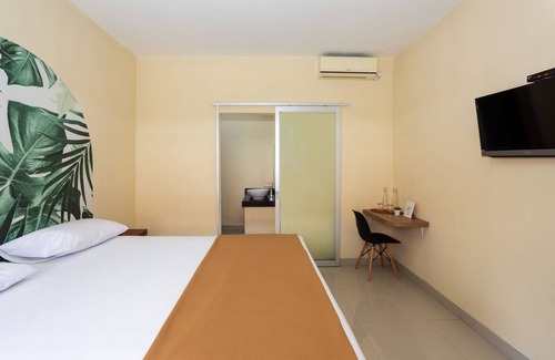 Denpasar Barat House | Cozy co-living that has two buildings separated by a pool to cool down and relax