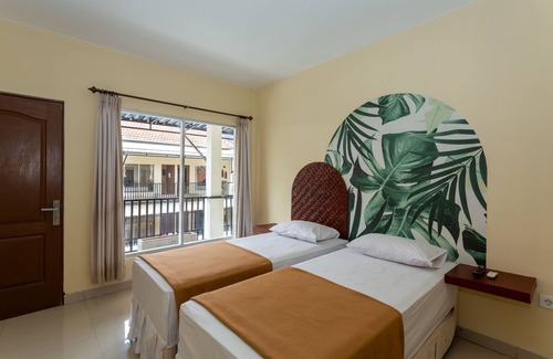 Denpasar Barat House | Cozy co-living that has two buildings separated by a pool to cool down and relax