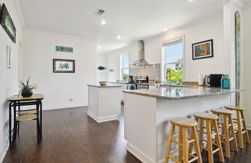 Henderson Point House | Cozy cottage surrounded by woods and just a short walk to the beach!