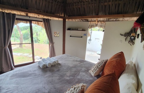 Mariato Bed & Breakfast | Cozy, cozy cabins, abundant breakfast, valley views, 1 km from the sea.