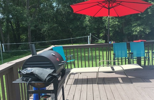 Carrolltowne House | cozy guest room with private bath kitchenette