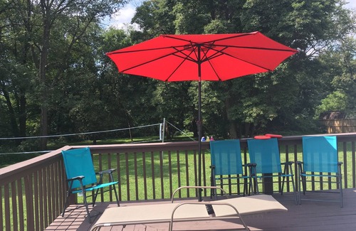 Carrolltowne House | cozy guest room with private bath kitchenette