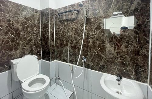 Manado City Centre Hotel | Cozy Home 2 RedPartner