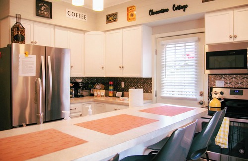 Washington House | Cozy little house blocks from the Park & Fair Grounds. EV Charger equipped.