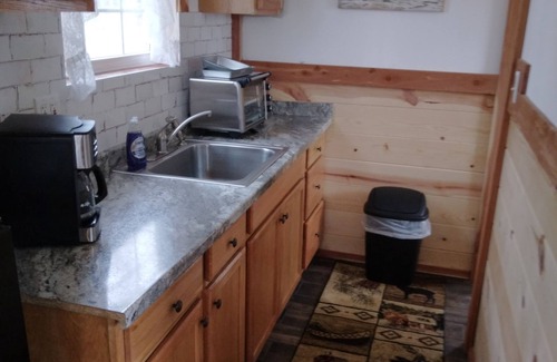 Wilburn Cabin | Cozy little red cabin in hebersprings ar.