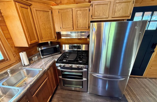 Coal Valley Cabin | Cozy Log Cabin overlooking a pond with a fire pit, game area and rustic charm