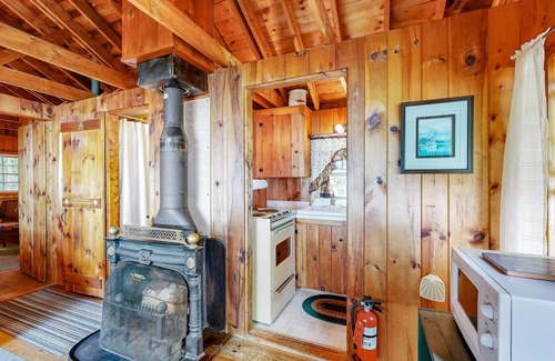 Northport Cabin | Cozy Log Cabin with Deck, Picnic Table & Breath-taking View