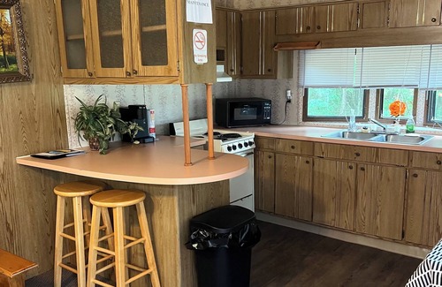 Easton House | Cozy mobile home/cabin on campground in Adams, WI.