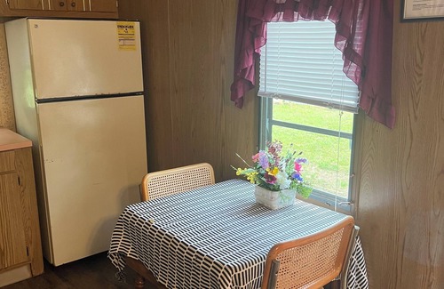 Easton House | Cozy mobile home/cabin on campground in Adams, WI.