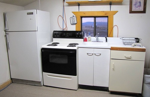 Lima Cabin | Cozy rustic cabin on Little Sheep Creek at foot of Lima Peaks