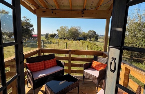 Rockfield Cabin | Cozy Tiny Home at Traveler's Cellar Winery in Rockfield with Vineyard views.