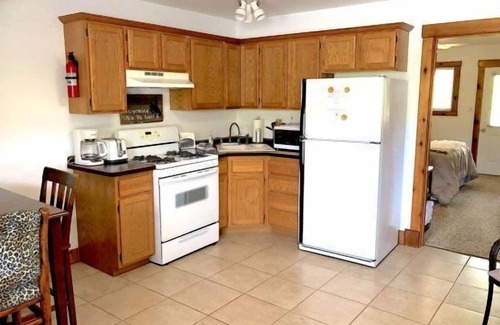 Cody Apartment | Creek Side Cabin #2- Wapiti Valley, steps from Trout Creek