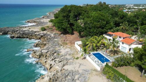 Playa Chiquita Villa | Crimson beach ocean front entire floor villa