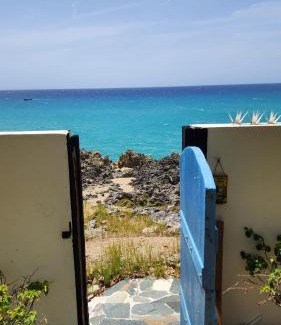 Playa Chiquita Villa | Crimson beach ocean front entire floor villa