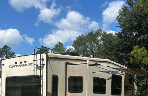 Ashburn House | Cruiser Travel Trailer fully hooked up and ready for you to enjoy!