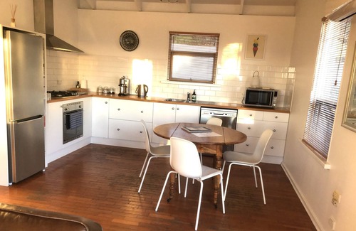 Carrickalinga Cottage | CURROLGA Elevated Seaviews, Tranquil Coastal Retreat Rolling hills, Dogs welcome