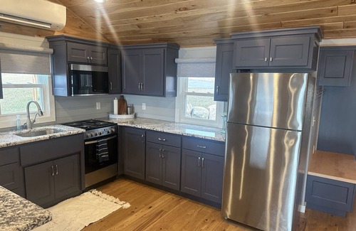 Faribault Cabin | Cute & Cozy Cabin at Le Mieux Resort on Cedar Lake with an Incredible View