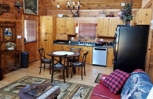 Arley Cabin | Cute, cozy log cabin on beautiful Smith Lake, Arley AL (year round deep water)