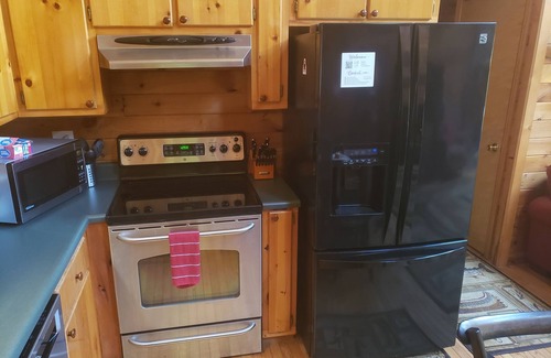 Arley Cabin | Cute, cozy log cabin on beautiful Smith Lake, Arley AL (year round deep water)