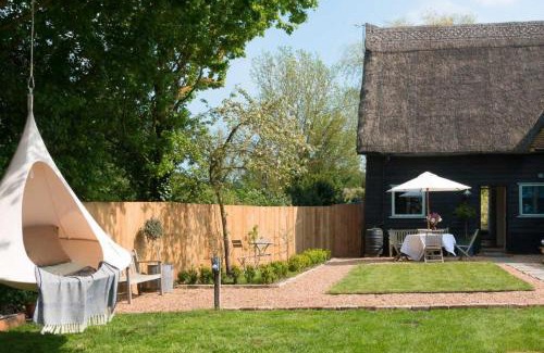Stowmarket House | Deepwell Granary is a lovely thatched barn with attached meadow woodland