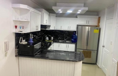 Gregorio Luperon Apartment | Delicado apartamento con piscina.