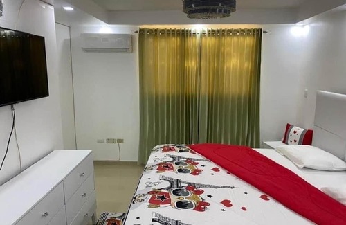 Gregorio Luperon Apartment | Delicado apartamento con piscina.