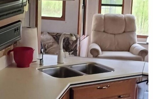 Madison House | Delightful 5th wheel w/ queen bed, patio deck, and high speed internet.