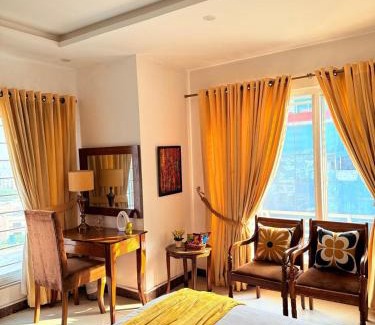 Islamabad Apartment | Deluxe King with Sunset Yellow Hues in Bahria Phase 4 Islamabad