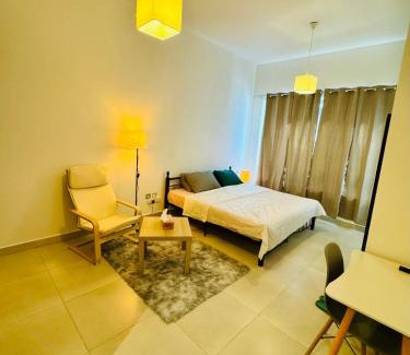Al Muraqqabat House | Deluxe Serviced Room with Attached Toilet near Rigga Metro & Airport with all Modern Facilities