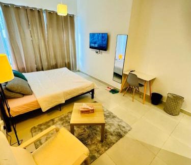 Al Muraqqabat House | Deluxe Serviced Room with Attached Toilet near Rigga Metro & Airport with all Modern Facilities
