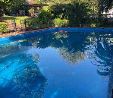 San Isidro House | Departamento Ocre con gran jardín