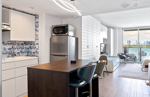 West Avenue Condo | Design Studio Miami Beach Stunning Bay View Balcony Queen Murphy & twin trundle