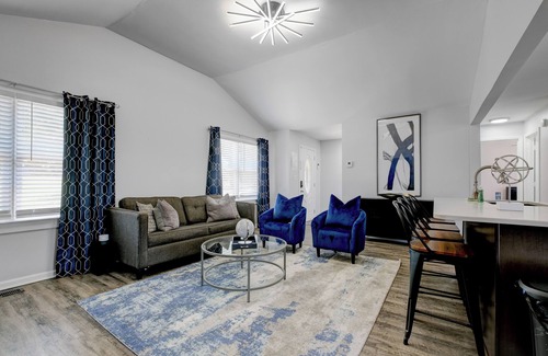 Fairburn Apartment | Discover your ideal Georgia retreat in this fully renovated, 3-bedroom ranch-style Retreat that sleeps 8. Enjoy a spacious master suite, an open-concept kitchen with modern appliances, and chic décor throughout.