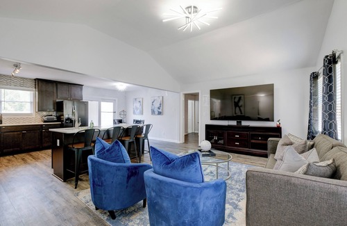 Fairburn Apartment | Discover your ideal Georgia retreat in this fully renovated, 3-bedroom ranch-style Retreat that sleeps 8. Enjoy a spacious master suite, an open-concept kitchen with modern appliances, and chic décor throughout.