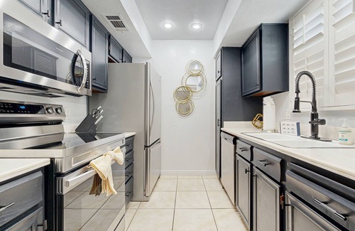 Baristo Condo | Dive into Palm Springs fun with a stylish home base featuring poolside lounging.