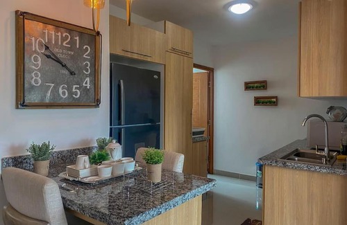 La Vega Province Apartment | DMero, Lujoso apartamento familiar cerrado.