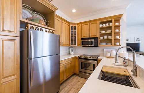 Clearwater Beach Condo | Dock of the Bay-Coastal Elegance! Waterfront Views, Pool, Dock, Walk Everywhere