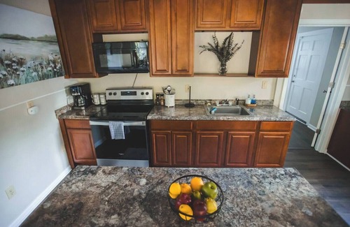 Cave Spring Cabin | Dockside Dreams at Rivers Edge Retreat – 2 bd/1ba Waterfront home on the Coosa River at Lake Weiss (GA/AL line). This updated, newly renovated ranch-style home offers the perfect setting to unplug, recharge and make wonderful lifetime memories!