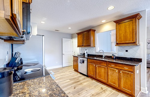 Pooler House | Dog-friendly home with large yard, open layout, primary suite, W/D, & AC