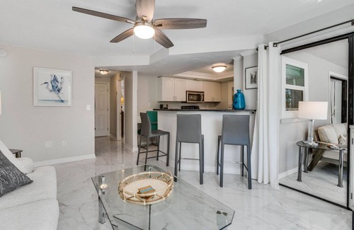 East Naples House | Dog-friendly lakefront home with hot tub, gazebo, firepit, outdoor kitchen, W/D