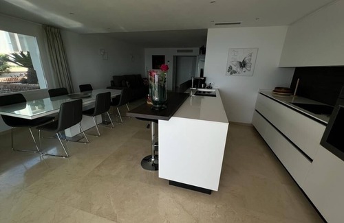 New Golden Mile Apartment | Dominion Beach Ground floor app. with garden 6 people directly by the sea and swimming pool