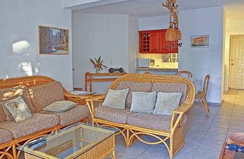 El Batey Apartment | Downtown guest-friendly condo steps from sandy beach!