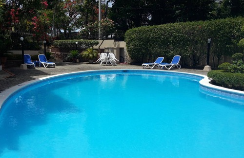 El Batey Apartment | Downtown guest-friendly condo steps from sandy beach!