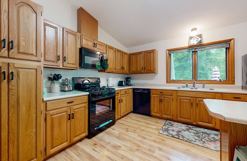 Empire House | Downtown home with a firepit, deck, washer/dryer, fireplace - near the beach