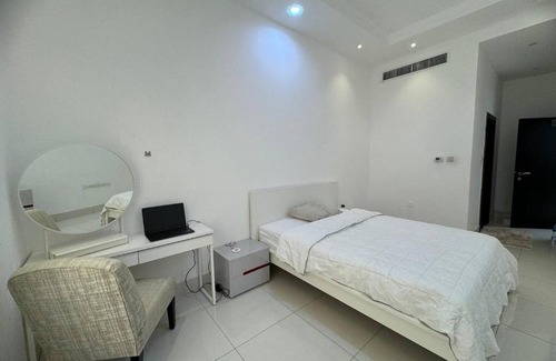 Al Satwa House | Dubai master bedroom with all amenities