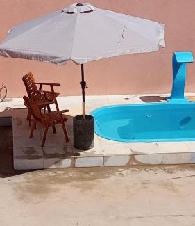 Aracati House | Duplex de 2 quartos com ar condicionado , piscina e estacionamento