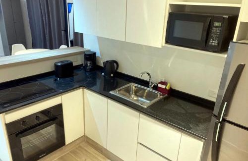 San Cristobal Apartment | Dzain Confort, gym, parrilla, estacionamiento , playroom cerca de todo