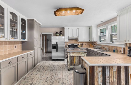 Mid City South House | Eclectic 3-bedroom home in exciting MidCity filled with local art!