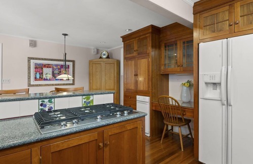 Nahant House | Edwardian home, fireplace, water views